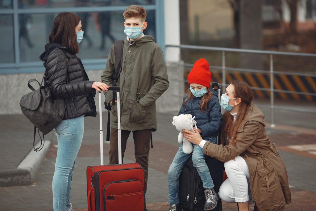 european-mothers-respirators-with-kids-are-standing-near-building-1024x683.jpg